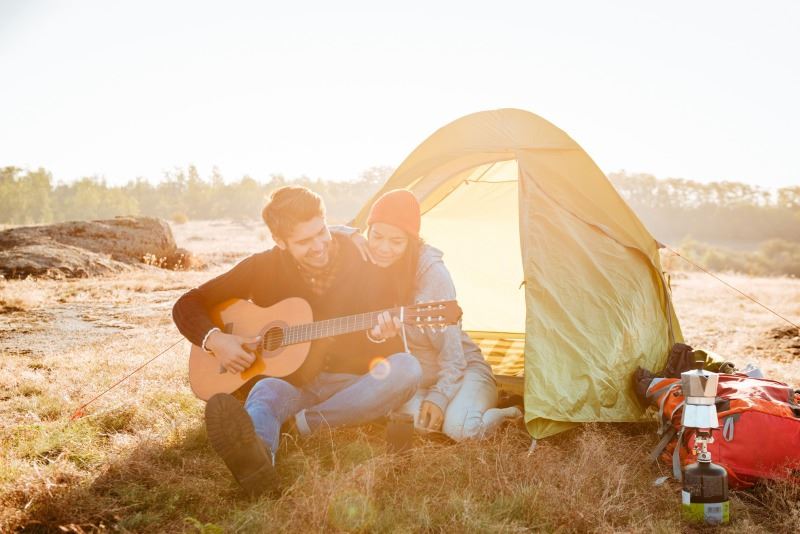 man and woman camping