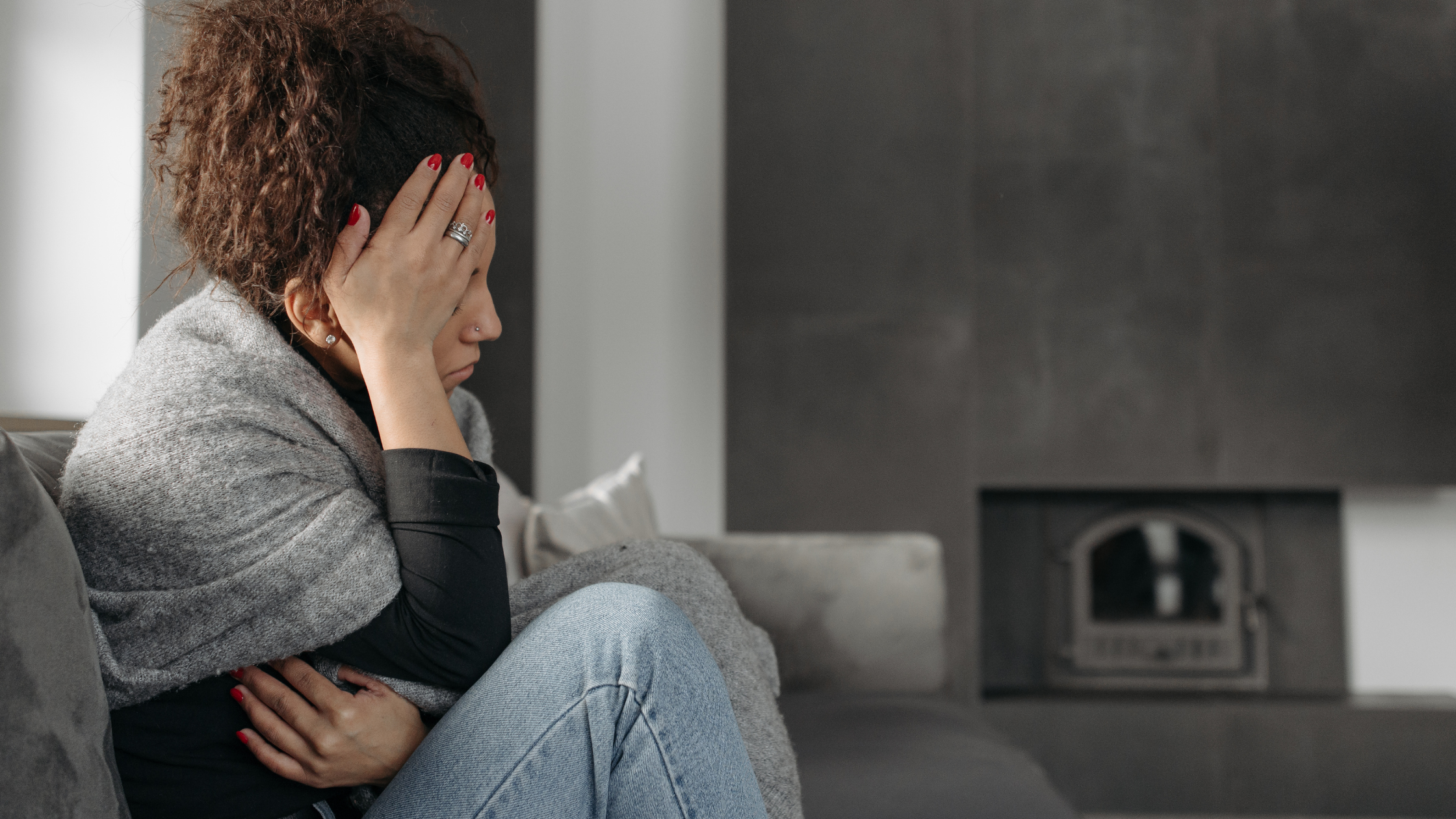 Image of someone sitting at home: “Outpatient therapy session for anxiety and addiction in Northridge”