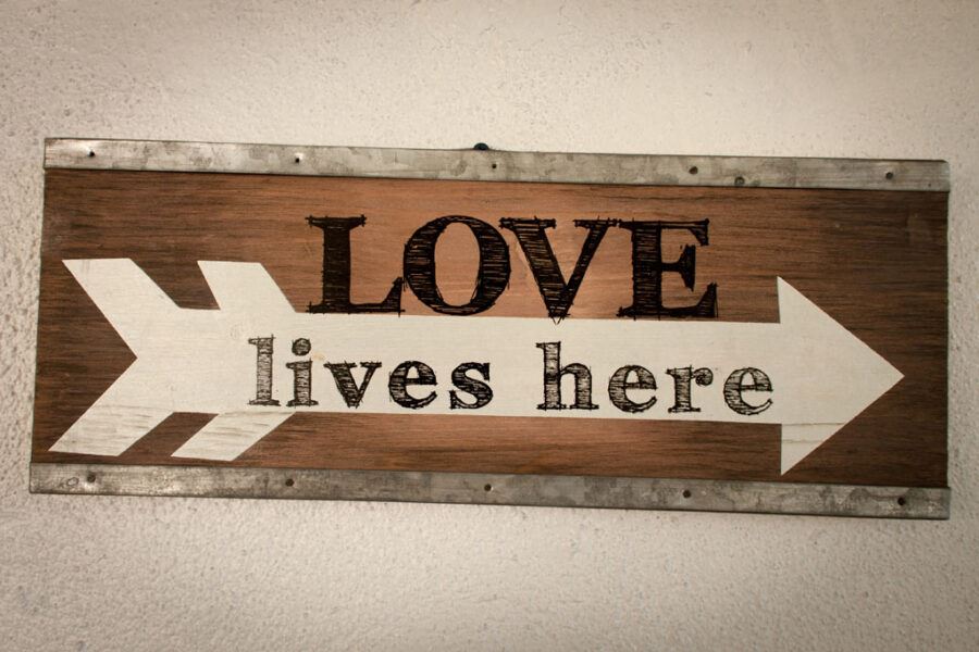 Love Lives Here sign
